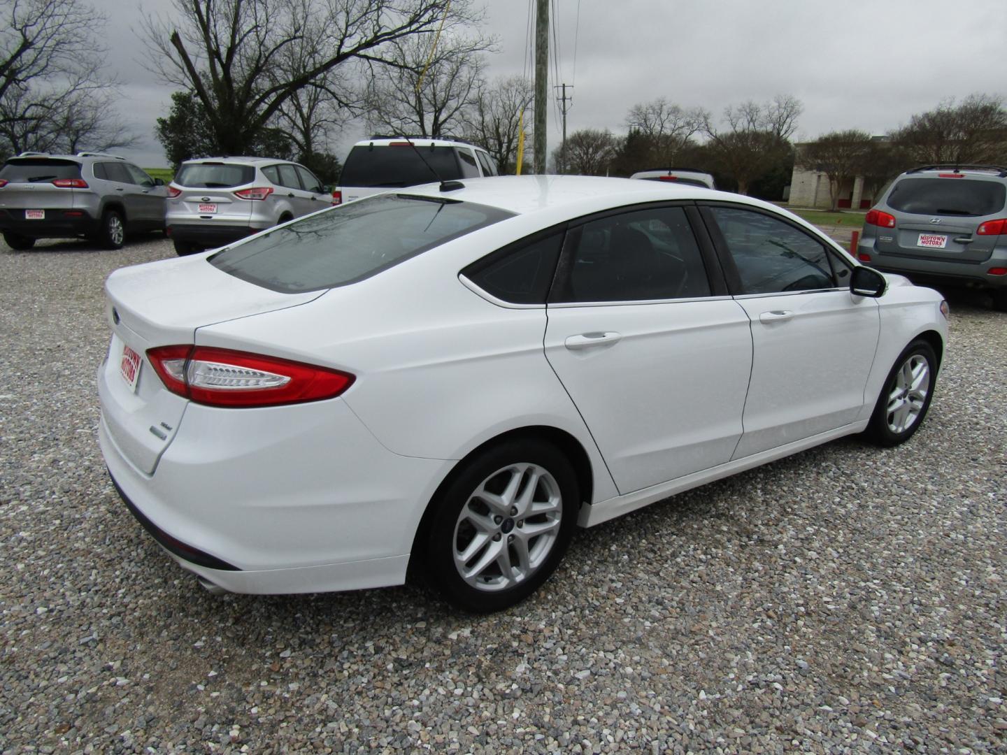 2015 White /Gray Ford Fusion SE (1FA6P0HD2F5) with an 1.5L L4 DOHC 16V engine, Automatic transmission, located at 15016 S Hwy 231, Midland City, AL, 36350, (334) 983-3001, 31.306210, -85.495277 - Photo#7